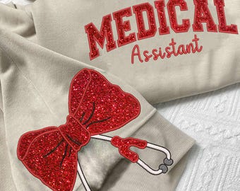 Embroidered Medical Assistant Sweatshirt, Glitter Stethoscope, Nurse Coquette Bow Side, Med Assistant, Certified Medical Assistant Shirt.