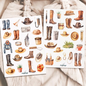 May include: Two sheets of stickers featuring watercolour illustrations of cowboy boots, hats, and other western-themed items. The stickers are on a white background and have the text "Kawi Design" on them.