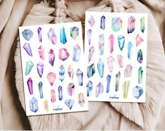 May include: Two sheets of stickers featuring watercolor illustrations of colorful crystals and gemstones. Each sheet has 24 unique designs.