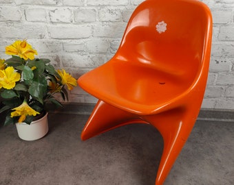 Casalino chair children design Alexander Begge for Casala 70s orange plastic space age vintage atomic midcentury sputnik stackable