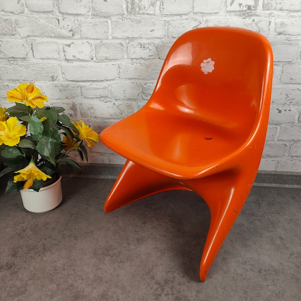 Casalino Stuhl Kinder Design Alexander Begge für Casala 70er Jahre orange Kunststoff space age vintage atomic midcentury sputnik stapelbar