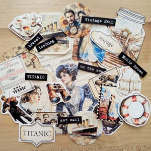 May include: A collection of vintage-themed paper cutouts featuring images of the Titanic, passengers, and related ephemera. Includes text labels like "Titanic", "iceberg", and "voyage". The color palette is dominated by sepia tones and muted blues.