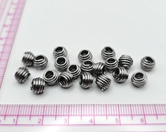 7mm Stainless Steel Coil Spring Beads - Large Rondelle - 3.5mm hole
