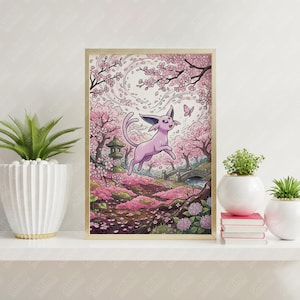 May include: A framed rectangular art print featuring a light purple creature leaping through a landscape of pink cherry blossom trees, a stone lantern, and a small bridge. The illustration includes a butterfly and scattered flower petals.