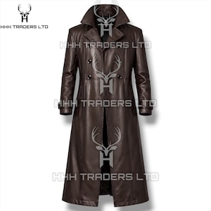 May include: A dark brown leather trench coat featuring a wide notched lapel, a double-breasted front with four visible black buttons, long sleeves with cuff straps, and a full-length hem. The text HHH TRADERS LTD is visible on the image.