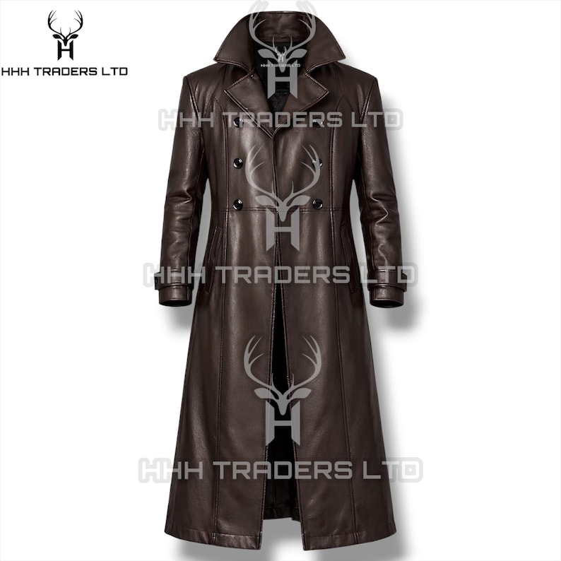 May include: A dark brown leather trench coat featuring a wide notched lapel, a double-breasted front with four visible black buttons, long sleeves with cuff straps, and a full-length hem. The text HHH TRADERS LTD is visible on the image.