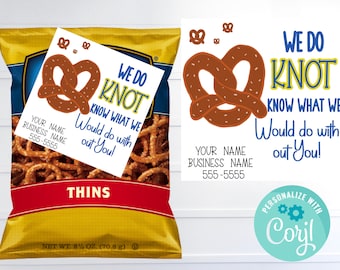 May include: A bag of pretzel thins with a tag that says "We do knot know what we would do with out you!" The tag has a pretzel illustration and the text "We do knot" in yellow and blue. The bag is yellow and blue with the words "Thins" and "Net Wt. 2 1/2 oz. (70.8 g)" printed on it.