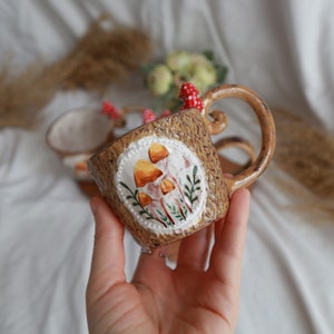 pottery ceramic mug designed with mushroom