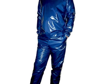 May include: A blue shiny tracksuit with a long-sleeved top and matching pants.