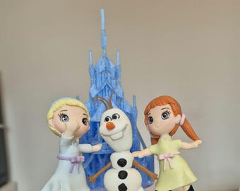 Elsa, Anna & Olaf Cake Topper Set with Castle. Inedible and Handcrafted with Eco-Friendly, Plastic-Free, Non-Toxic Cold Porcelain