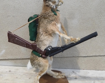 Hare as a hunter, hunting hare, hare with backpack