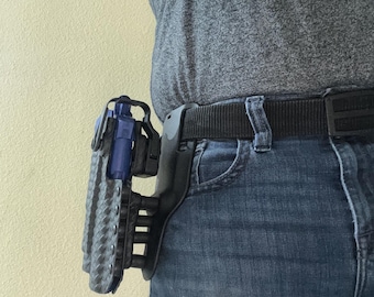 Mid/Low ride Level ll duty holster w/ hood, for FN 5.7 MK 3 pistol w/ TLR1 weapon mounted lights, ideal for on-duty uniformed LE w/ 2” Db