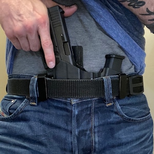 Glock 19, 23, 32, 45 & 19x w/Olight Baldr S Appendix Sidecar style holster, shown in All tactical black Carbon Fiber Kydex zdjęcie 5