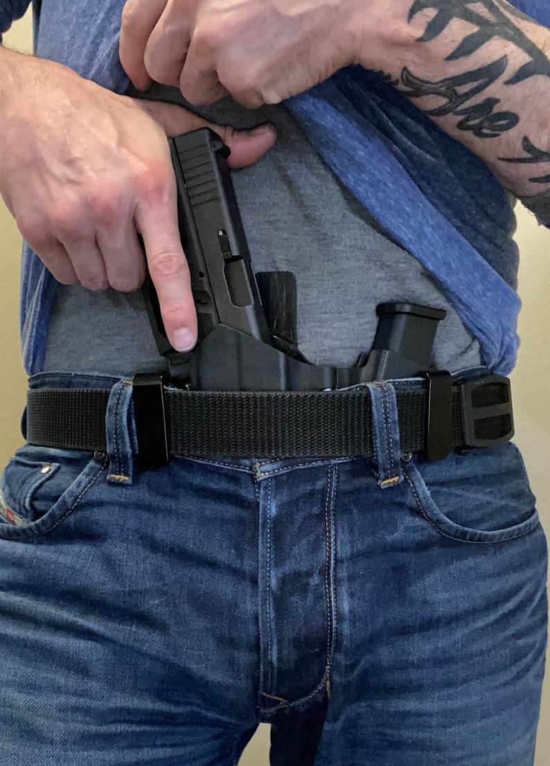 Glock 19, 23, 32, 45 & 19x w/Olight Baldr S Appendix Sidecar style holster, shown in All tactical black Carbon Fiber Kydex zdjęcie 5