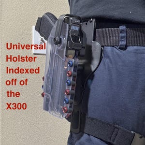 Funda universal OWB Nivel II de LT indexada a partir de la luz montada en arma Surefire X300. Se envía exactamente como se muestra en la foto principal.