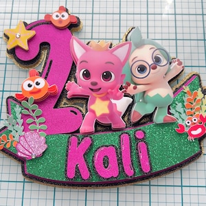 Pinkfong and Hogi cake topper