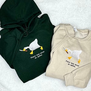 Murder Duck Hoodies and Crewneck Sweatshirts, Peace was Never an Option, Untitled Goose Game 50/50 Cotton Poly