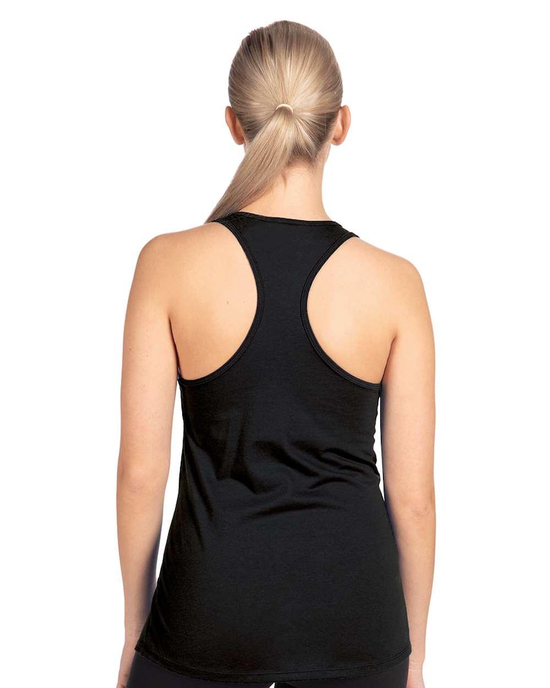 May include: Black racerback vest. The sleeveless top has a scoop neck and a racerback design. The vest is made of a soft, lightweight material. The back of the vest is visible in the image.