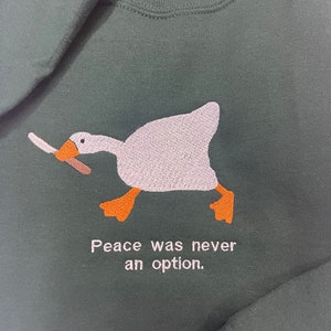 Murder Duck Hoodies and Crewneck Sweatshirts, Peace was Never an Option, Untitled Goose Game 50/50 Cotton Poly
