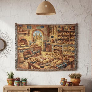 May include: A cozy living room scene featuring a tapestry depicting a bakery interior, hanging above a wooden cabinet. The room includes a blue ottoman, potted plants, a sunburst mirror, and a woven pendant light, creating a warm and inviting atmosphere.