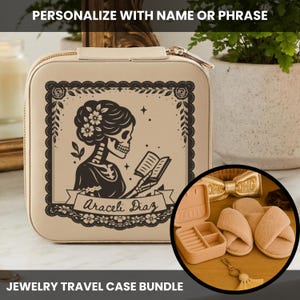 May include: Beige jewelry travel case with a black illustration of a skeleton reading a book, framed by a decorative border. The case has a gold zipper and the text "PERSONALIZE WITH NAME OR PHRASE" and "JEWELRY TRAVEL CASE BUNDLE". A bundle of accessories is shown.