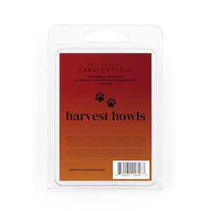 May include: A package of West Coast Candle Studio wax melts. The label is red and orange with the text "harvest howls" and paw prints. The product is pet-friendly, made with pure soy wax, and paraffin-free.