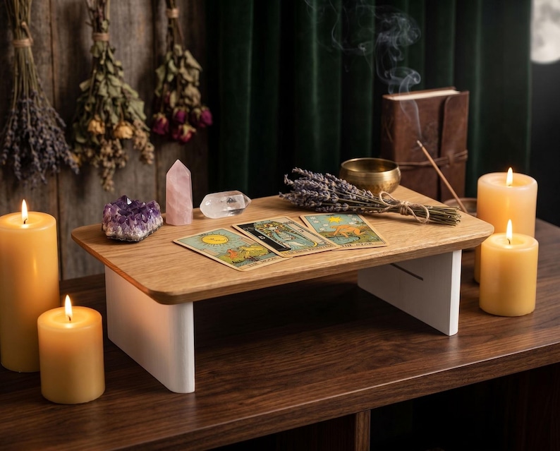 a wooden altar with candles, crystals, tarot cards, and dried flowers, creating a serene and spiritual atmosphere.