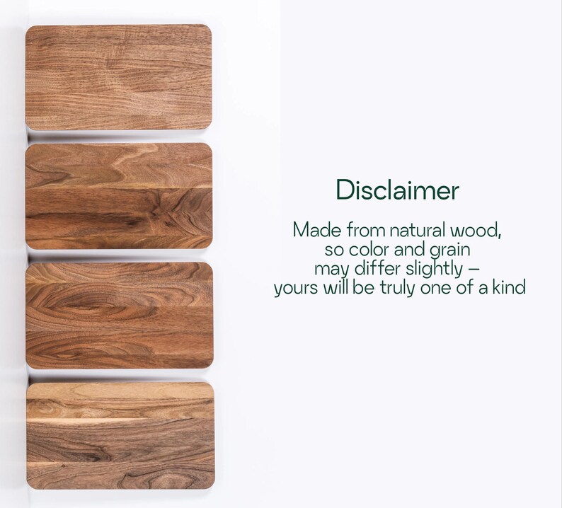 four wooden cutting boards, each with a different color and grain pattern, arranged side by side.