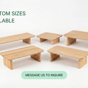 a collection of six wooden tables or benches, each with a different size and shape, arranged in a circular pattern. The text "CUSTOM SIZES AVAILABLE" is displayed above the arrangement, indicating that these tables can be customized in size. At the bottom of the image, there is a message that reads "MESSAGE US TO INQUIRE", suggesting that the image is part of a larger collection and that viewers can reach out to inquire about the available sizes.