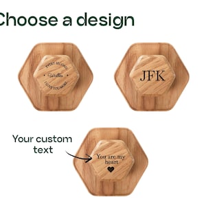a couple of wooden coasters sitting on top of each other