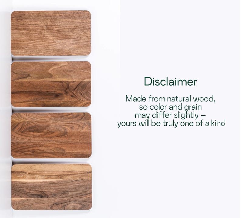 four wooden cutting boards, each with a different color and grain pattern, arranged side by side.