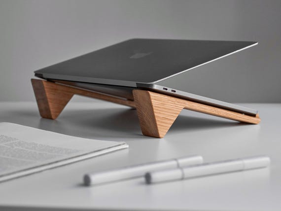 Adjustable aluminum laptop stand for ergonomic workspace