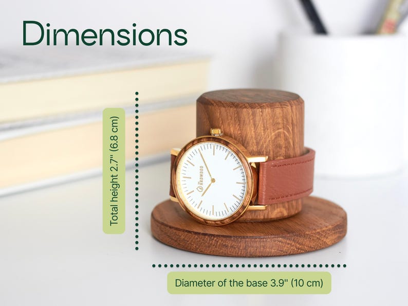 A wooden watch stand holding a gold-colored watch with a brown leather strap. The image also includes dimensions and a description of the watch and its stand.