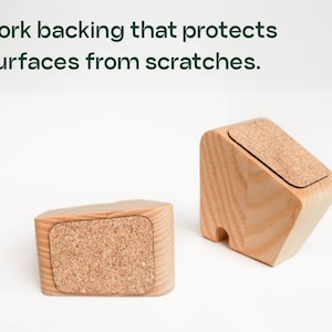a wooden block with a cork backing that protects surfaces from scratches