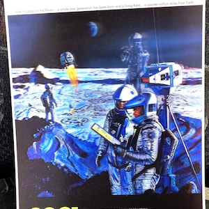 May include: A movie poster for the film "2001: A Space Odyssey" featuring a dramatic scene of astronauts on the moon. The poster has a blue, white, and black color scheme and features the text "An epic drama of adventure and exploration".