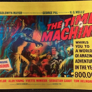 May include: A vintage movie poster for "The Time Machine" in vibrant colors. The poster features a dramatic scene with figures in a futuristic setting, with the title in large red letters. Text includes the year 800,000 and the names of the actors.