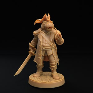 May include: A brown painted miniature figurine of a hippopotamus wearing a pirate costume. The hippopotamus is holding a small cup in its right hand and a sword in its left hand. The figurine is standing on a round base.