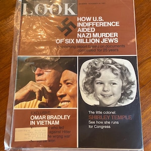 May include: A November 14, 1967 issue of Look magazine featuring a brown cover with the title LOOK, a swastika, and text about Nazi history. It includes a photo of two men, a photo of Shirley Temple, and text about Omar Bradley in Vietnam.