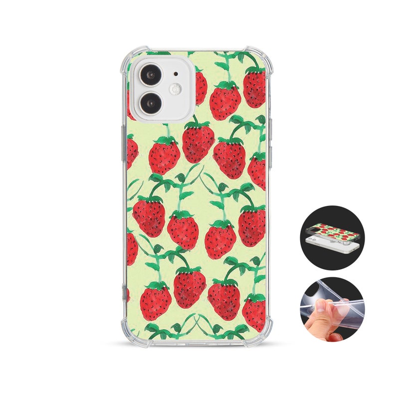 May include: A clear phone case with a repeating pattern of red strawberries and green stems on a pale green background. The case is designed to fit a smartphone, offering protection.