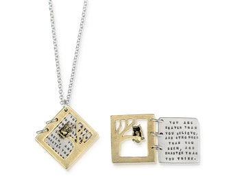 May include: A silver chain necklace with a brass pendant that opens to reveal a small owl charm and a message that reads "You are braver than you believe, and stronger than you seen, and smarter than you think."