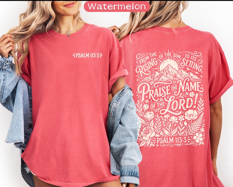 May include: A watermelon-colored t-shirt with the text "PSALM 113:3" on the front. The back of the shirt features a graphic with the words "FROM THE RISING OF THE SUN TO ITS SETTING. PRAISE THE NAME OF THE LORD! PSALM 113:3" in a decorative font, with a mountain and floral design.