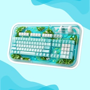 May include: A mechanical keyboard featuring a clear, transparent casing filled with a vibrant teal liquid, green moss-like textures, and small white pebbles. The keys are a mix of white and light blue, arranged in a standard layout with a numeric keypad.