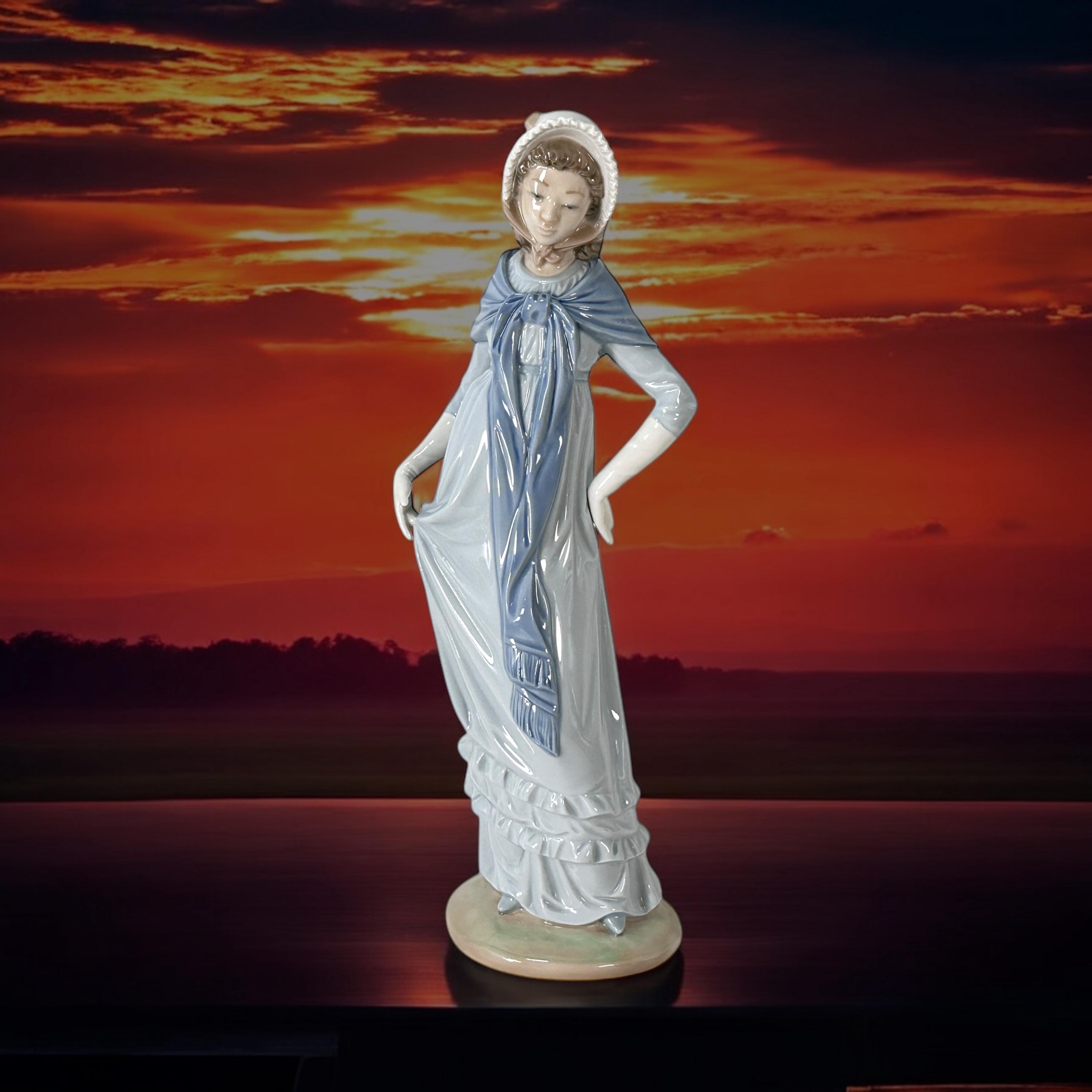 NAO by LLADRO Porcelain Figurine of Lady in Blue Dress and Bonnet
