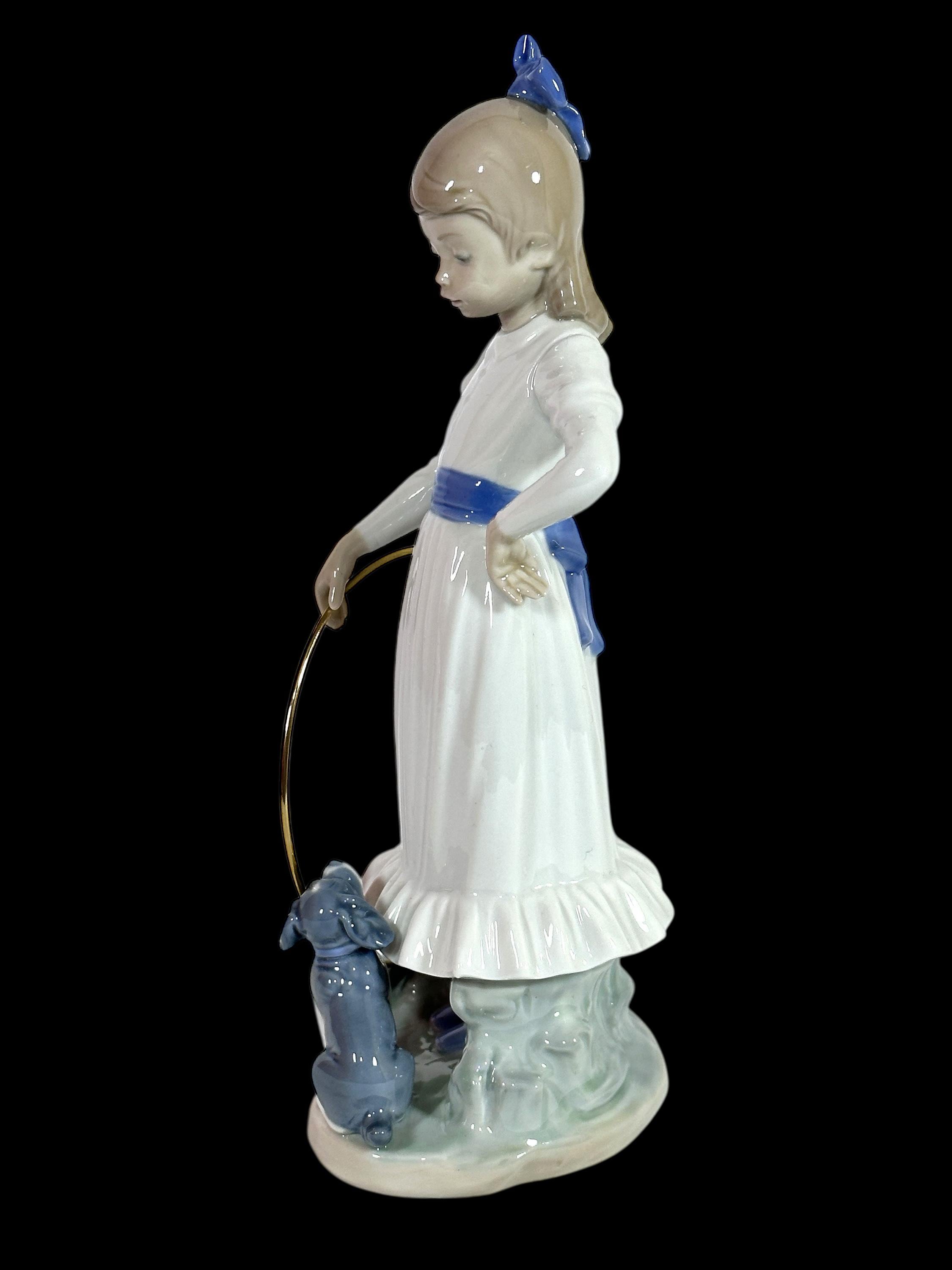 NAO by LLADRO Porcelain Figurine Girl With Hoop ' My Dog Does