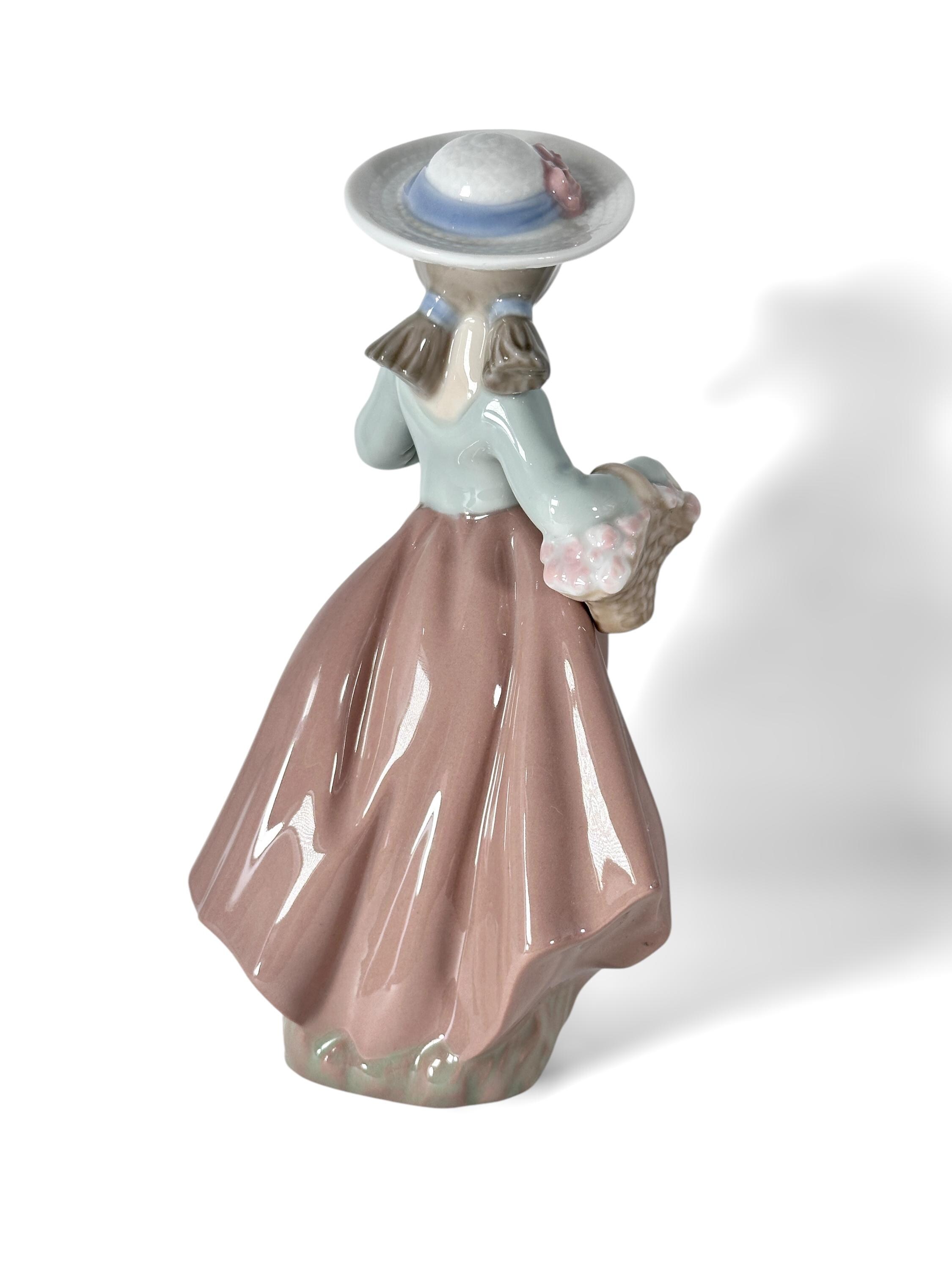 NAO by LLADRO Porcelain Girl in Brown Skirt With a Basket With
