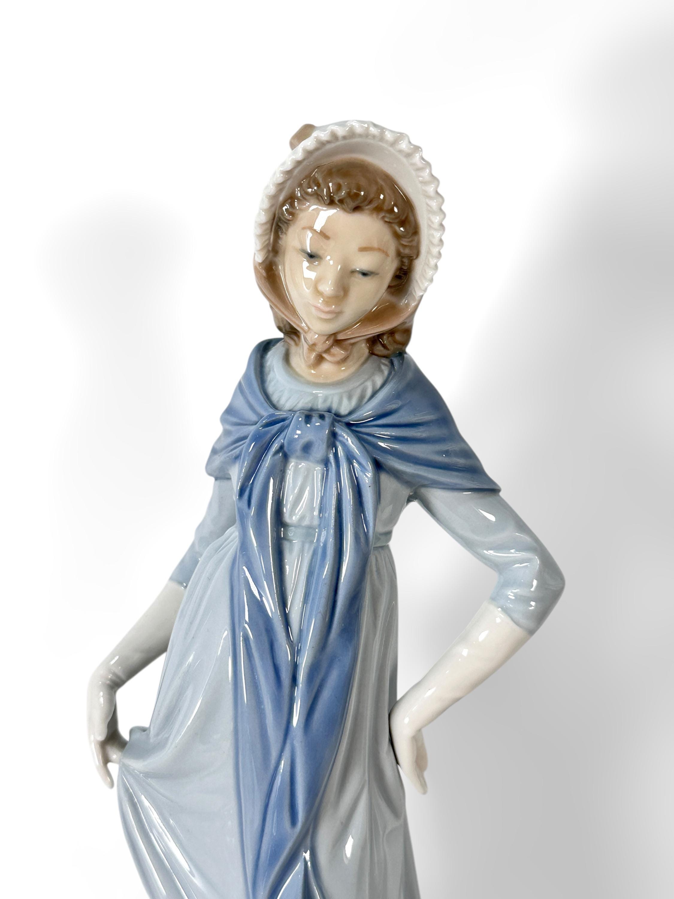 NAO by LLADRO Porcelain Figurine of Lady in Blue Dress and Bonnet