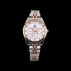 May include: A silver and rose gold wristwatch with a white face. The watch features three sub-dials, a date display, and the Beverly Hills Polo Club logo. The watch has a stainless steel band.