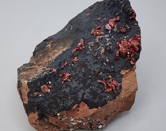 Vivacious Vanadinite on Black Goethite