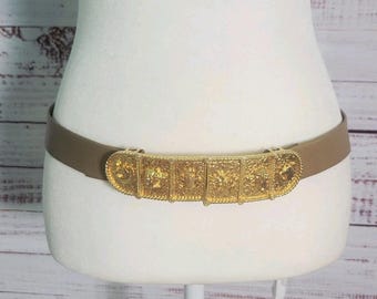 Cinturón vintage Accessocraft Equestrian Revival de los años 70, color dorado, con escudo de caza de caballos EP.