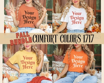May include: Four different color t-shirts with the text "Your Design Here" on them. The shirts are displayed on models against a background of fall decor. The text "FALL BUNDLE COMFORT COLORS 1717" is displayed at the bottom of the image.